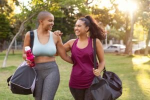 curvy friends walking home after fitness exercise picture id1141394562