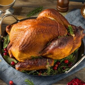 organic homemade smoked turkey dinner for thanksgiving picture id864774906