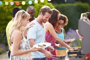 group of friends having outdoor barbeque at home picture id459926599